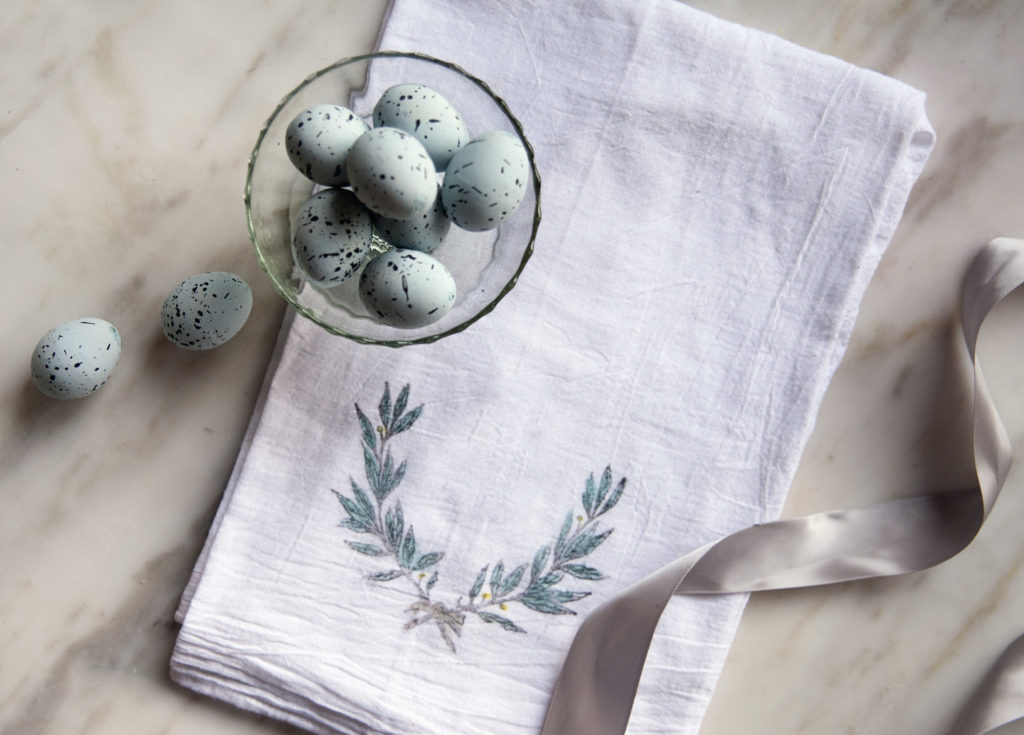 Design and paint your own watercolor tea towel using A Makers’ Studio stamps and Gel Art Ink. Make a beautiful laurel, floral tea towel for your kitchen or bathroom!